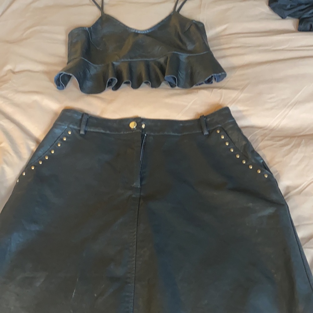 Zara black leather skirt! Dress up or down:)